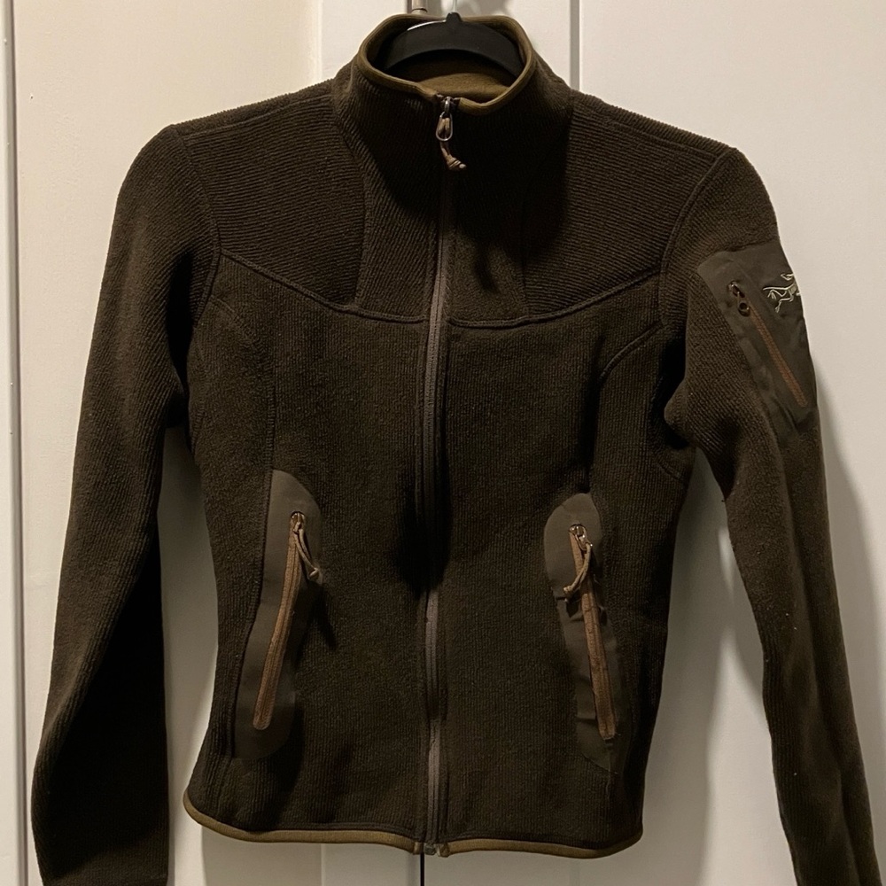 Arcteryx zip up sweater. Polartec. See side pocket pic for minor fraying.